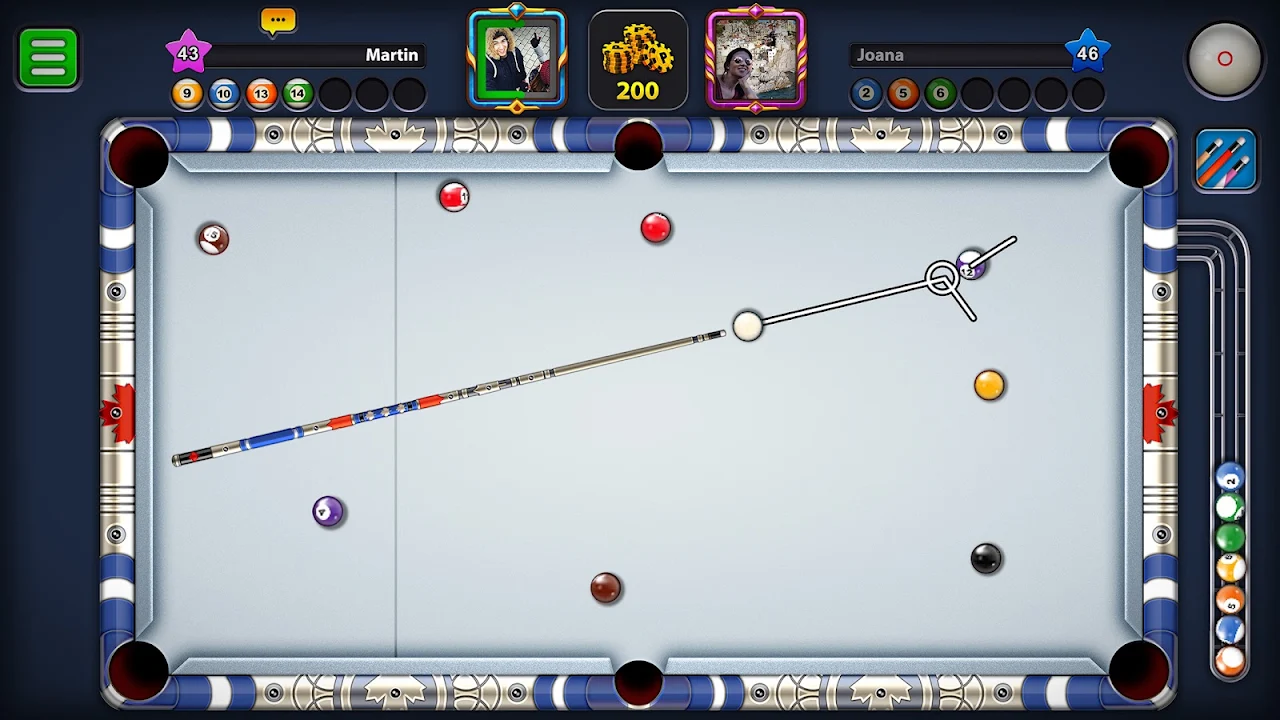 A patterned cue lining up a shot on a pale pool table